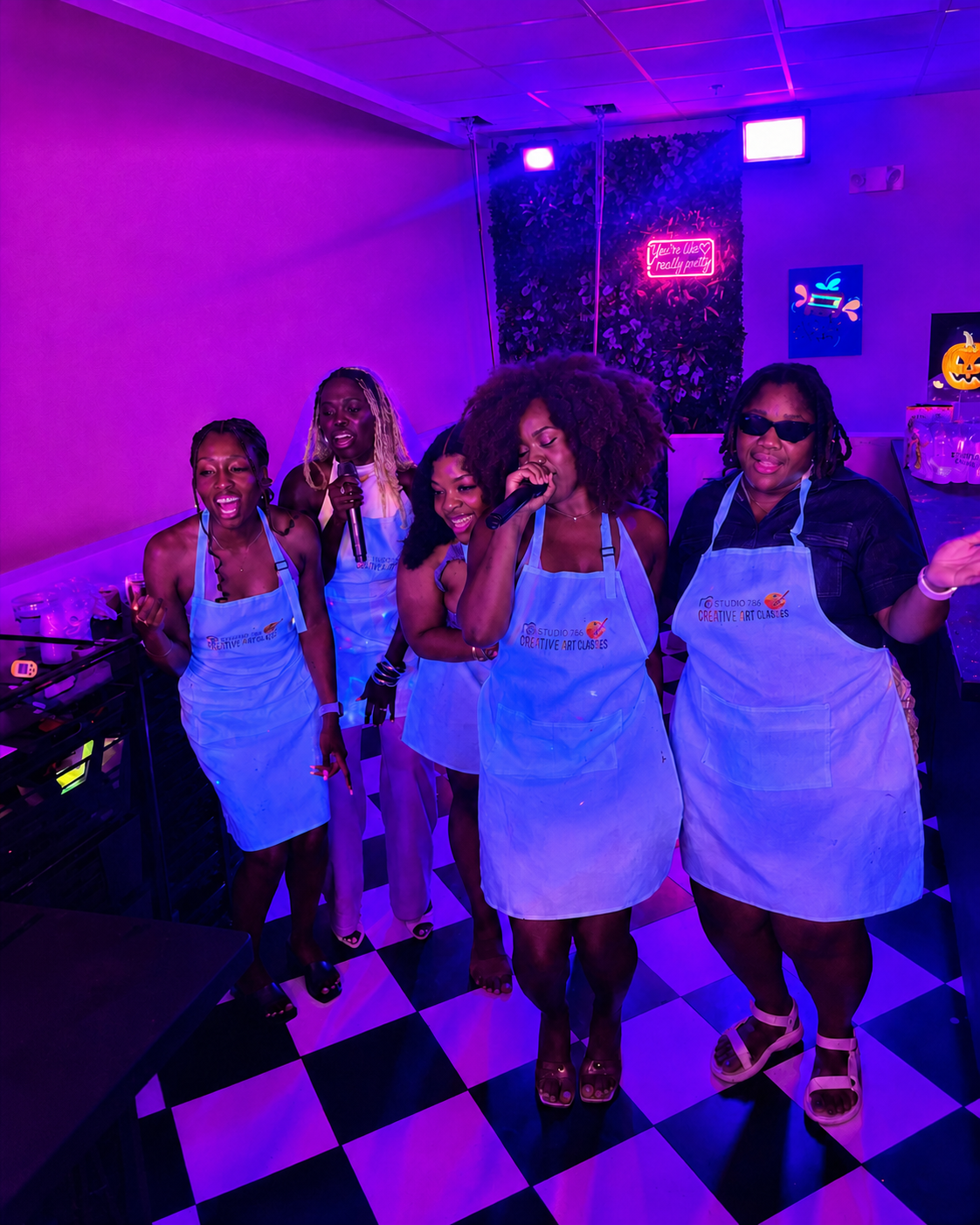 Guests singing during the Candles and Karaoke experience at Studio 786 in Houston